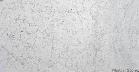 Bianco Carrara premium Italian white marble slab also known as Carrara White featuring timeless soft grey feathered veining with customizable finishes by Mistral Stone