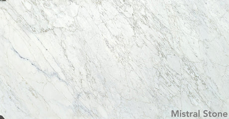 Bianco Miele premium white marble slab featuring delicate soft honey gold and amber veining with customizable finishes by Mistral Stone