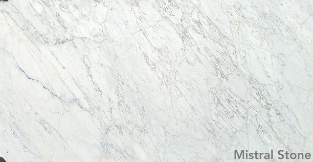 Bianco Miele premium white marble slab featuring delicate soft honey gold and amber veining with customizable finishes by Mistral Stone