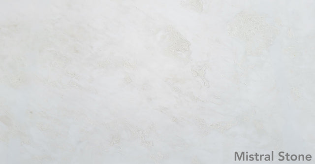 Bianco Rhino premium pure white marble slab featuring ultra-clean minimalist ivory cloud patterning with customizable finishes by Mistral Stone