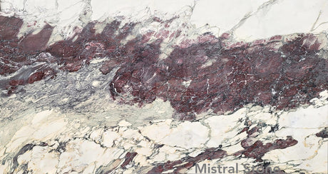 Breccia Capraia Extra Burgundy premium Italian marble slab featuring an intense horizontal band of deep wine red and burgundy brecciated veins with customizable finishes by Mistral Stone