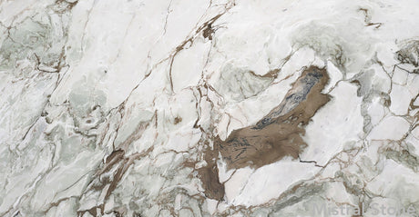 Premium Calacatta Giotto marble slab featuring an artistic multi-color topography of seafoam green and tobacco brown veins on a luminous white background with customizable finishes by Mistral Stone