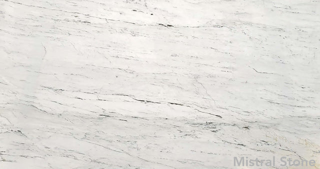 Premium Calacatta Green marble slab featuring elegant fine linear sage green and dark jade veining on a luminous white background with customizable finishes by Mistral Stone