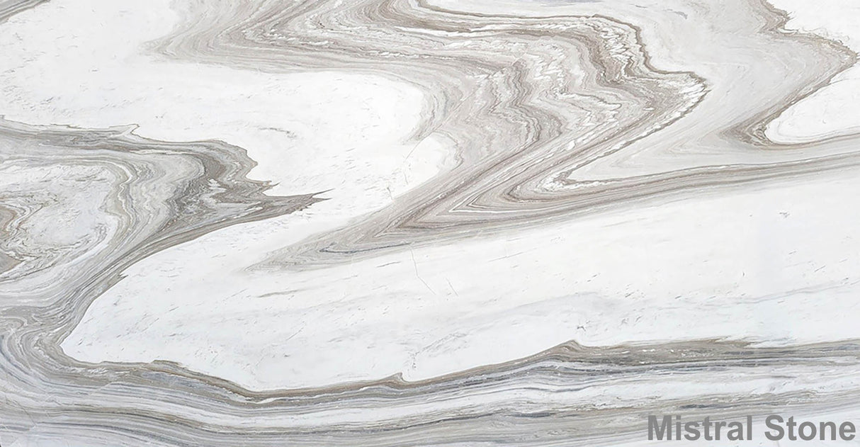 Premium Calacatta Wave marble slab featuring a dramatic fluid wave topography of taupe greige silver grey and mink brown layers on a luminous white background with customizable finishes by Mistral Stone